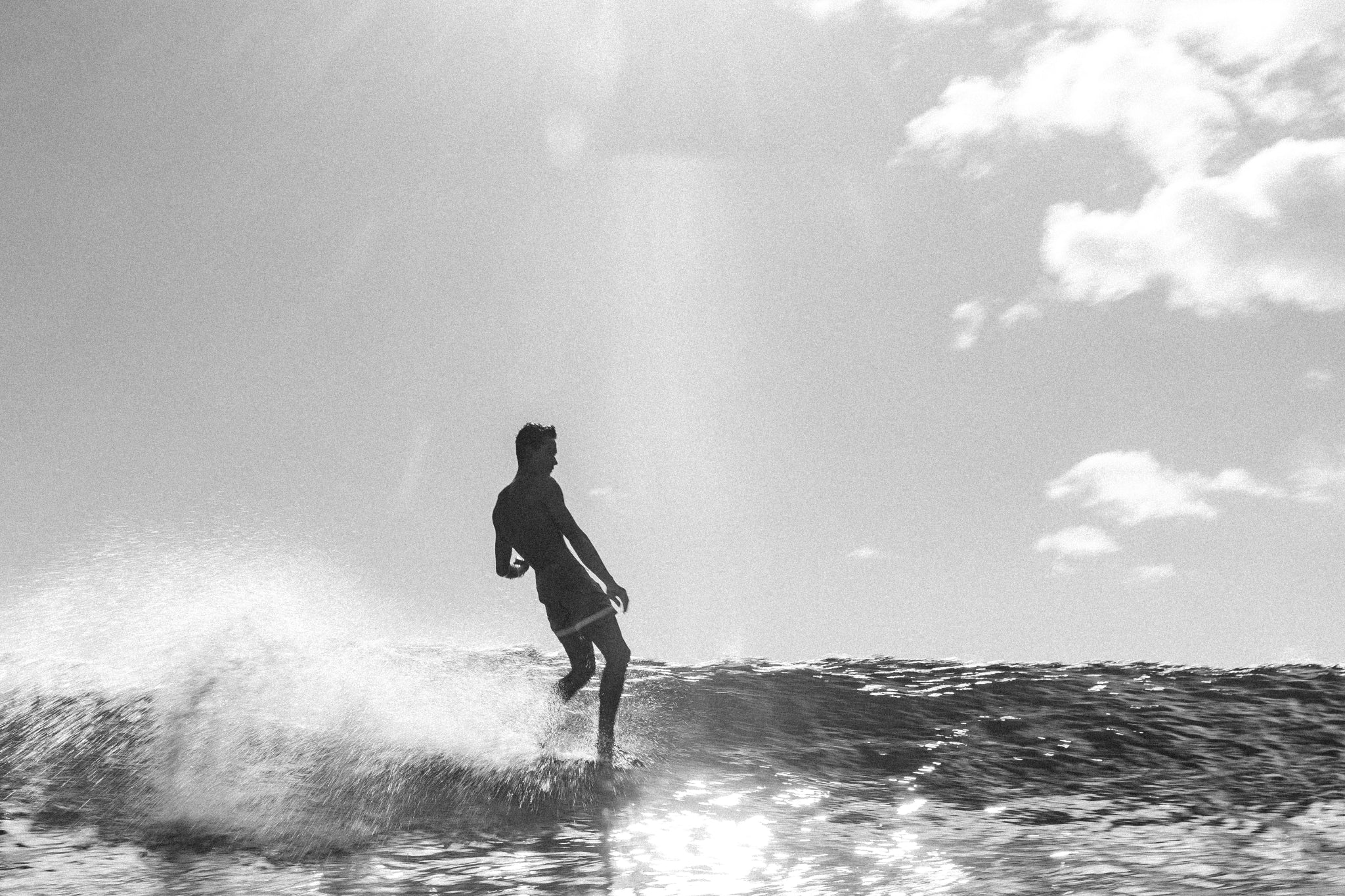 Kaimana Banes Surfing on a wave